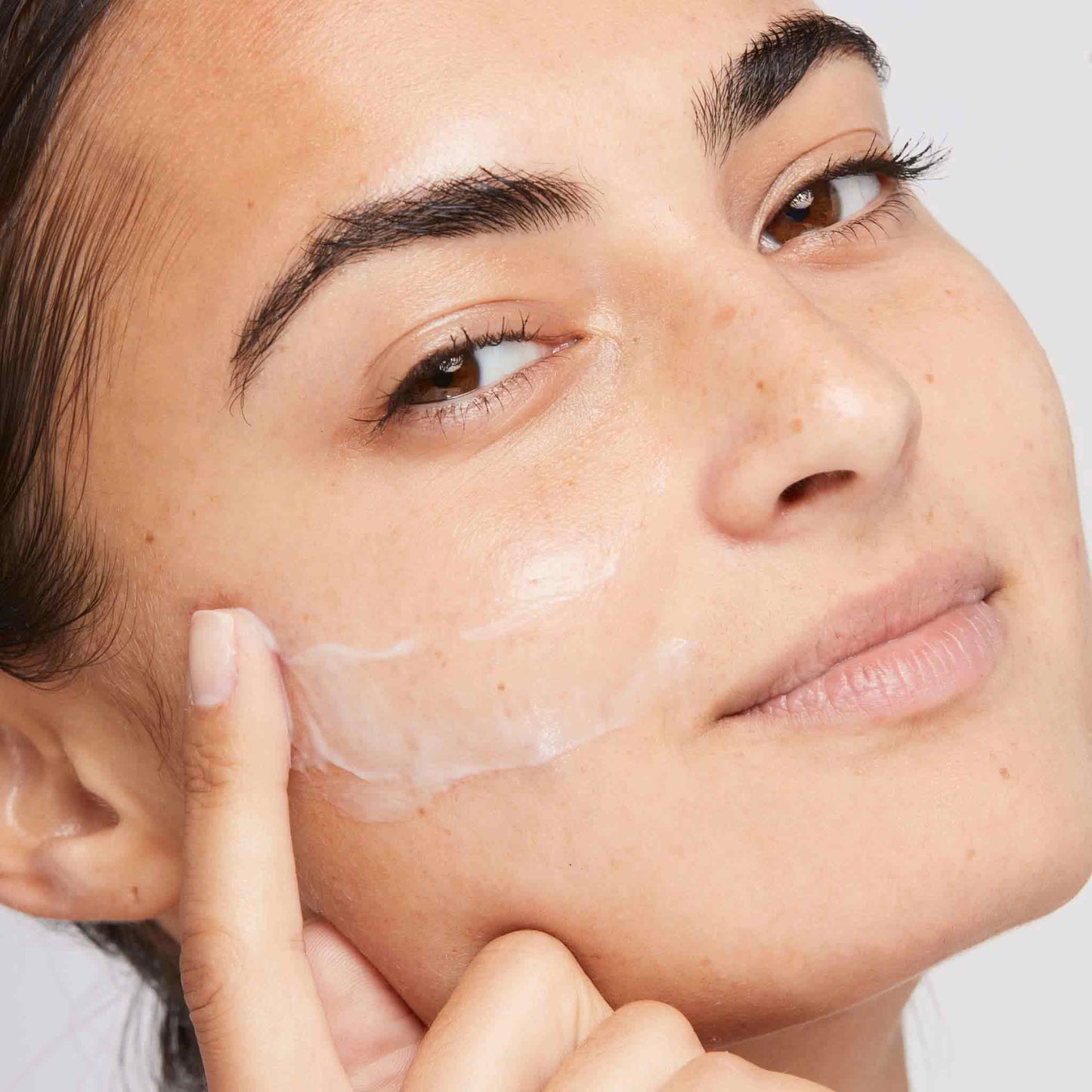 woman applying active moist 