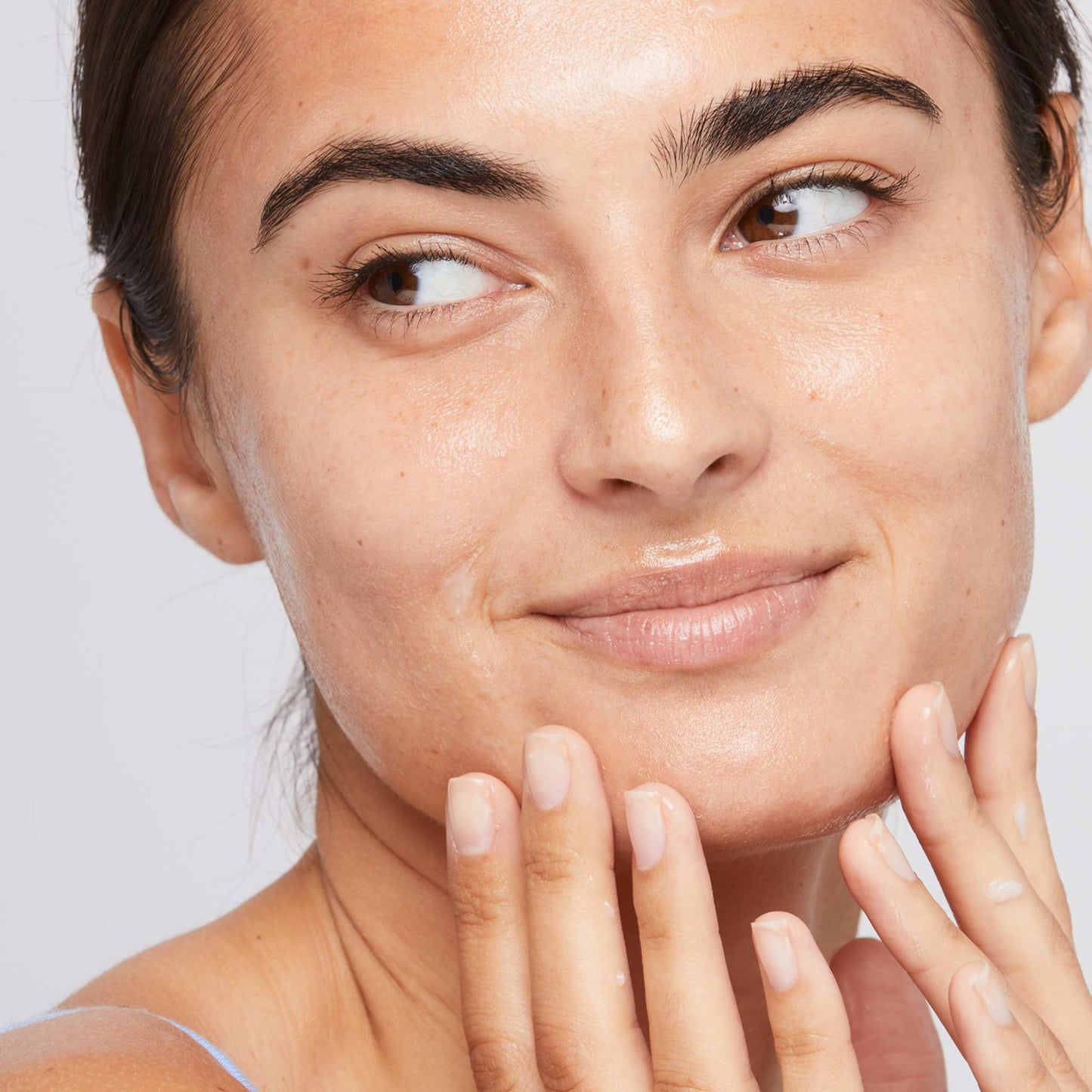 woman applying calm water gel 